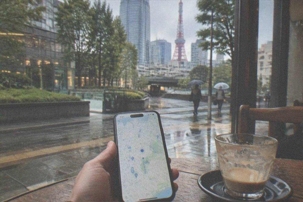 A smartphone showing a map of storage points in central Tokyo